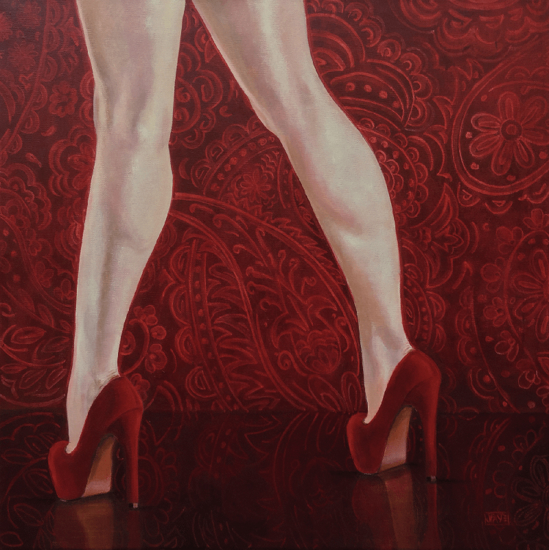 Woman's legs in red high heels